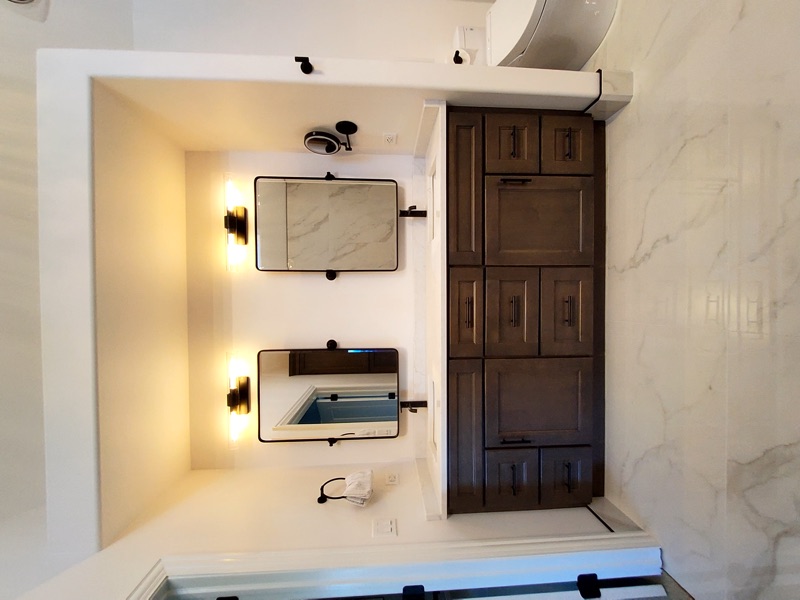 Custom tile bathroom remodel with double vanity in Chicago suburb