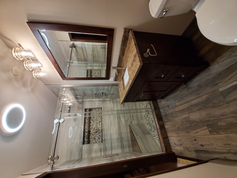 Small bathroom transformation with modern fixtures in Chicagoland home